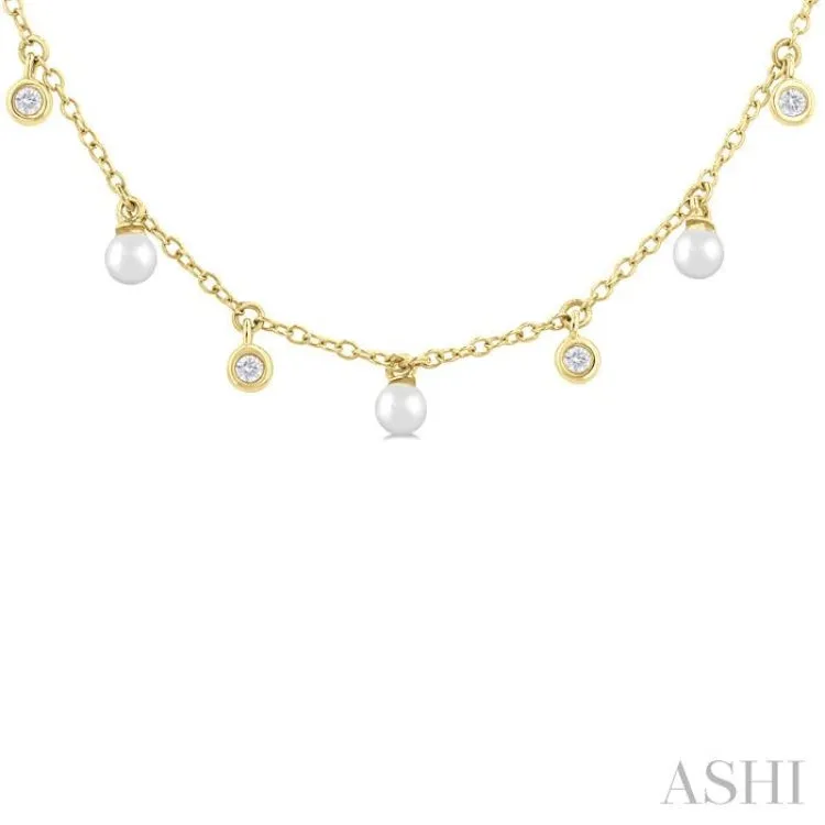 3 MM Cultured Pearl and 1/6 Ctw Round Cut Diamond Station Necklace in 14K Yellow Gold