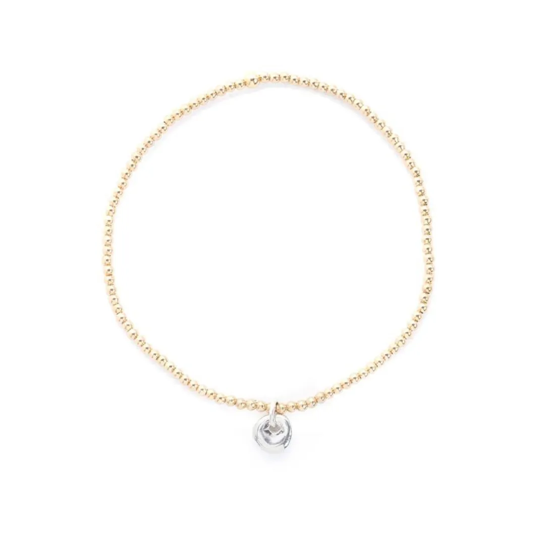 Small Stretchy Gold Tone Bracelet with Blip Lucky Stone