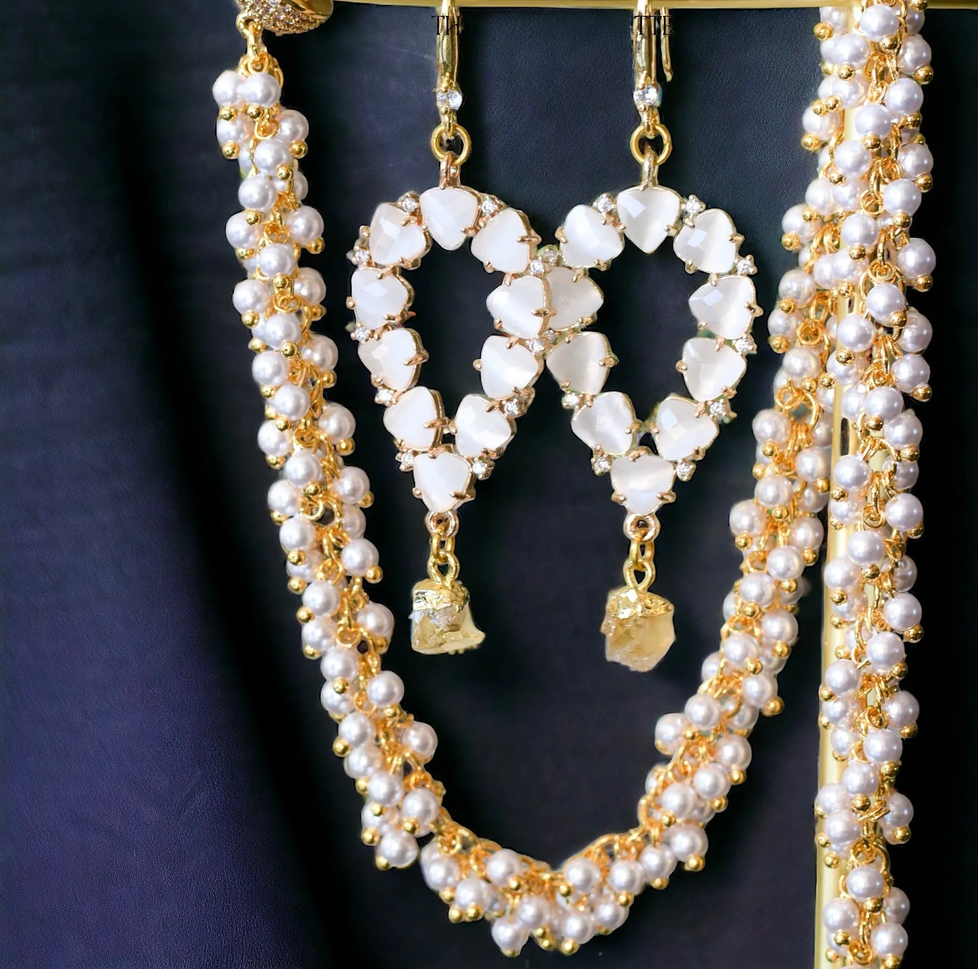 Yara white stones with gold edged amethyst drop earrings